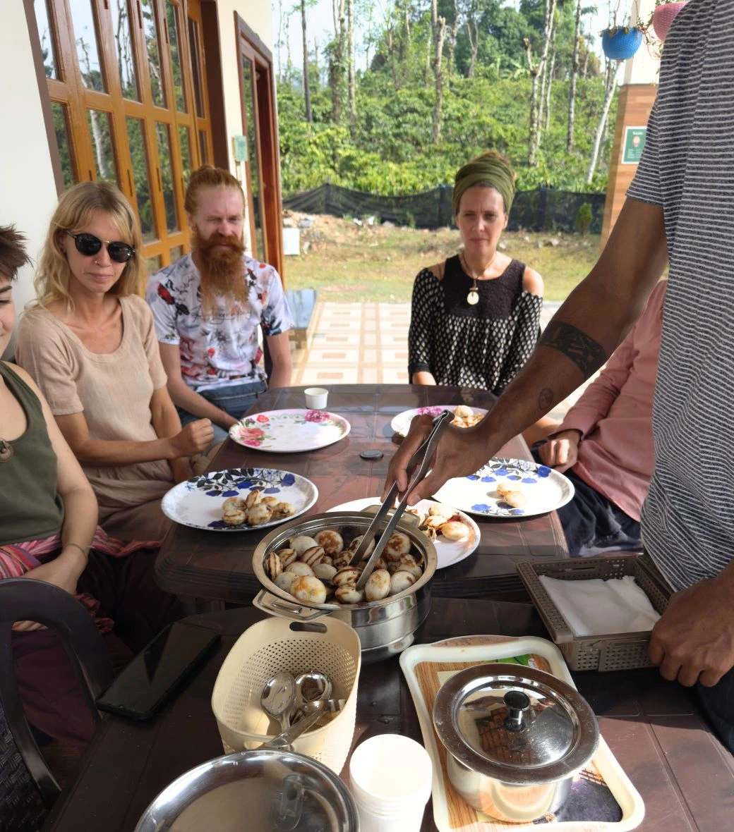 Guests enjoying home-cooked Malnad food at Astagiri Homestay Chikmagalur