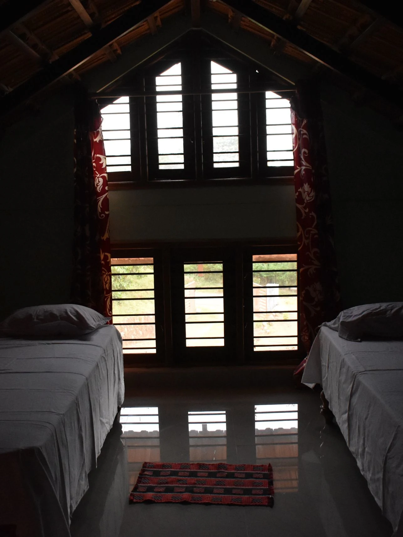 Shared room with bunk beds at Astagiri homestay in Chikmagalur.