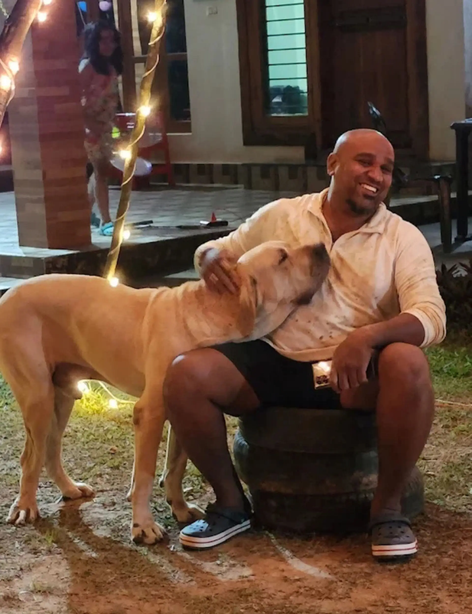 Traveler spending time with a friendly pet during the stay